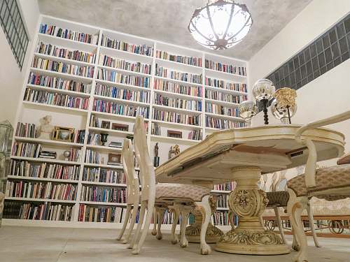 library vacant white wooden chair and table furniture